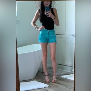 Turquoise blue shorts distressed bottom